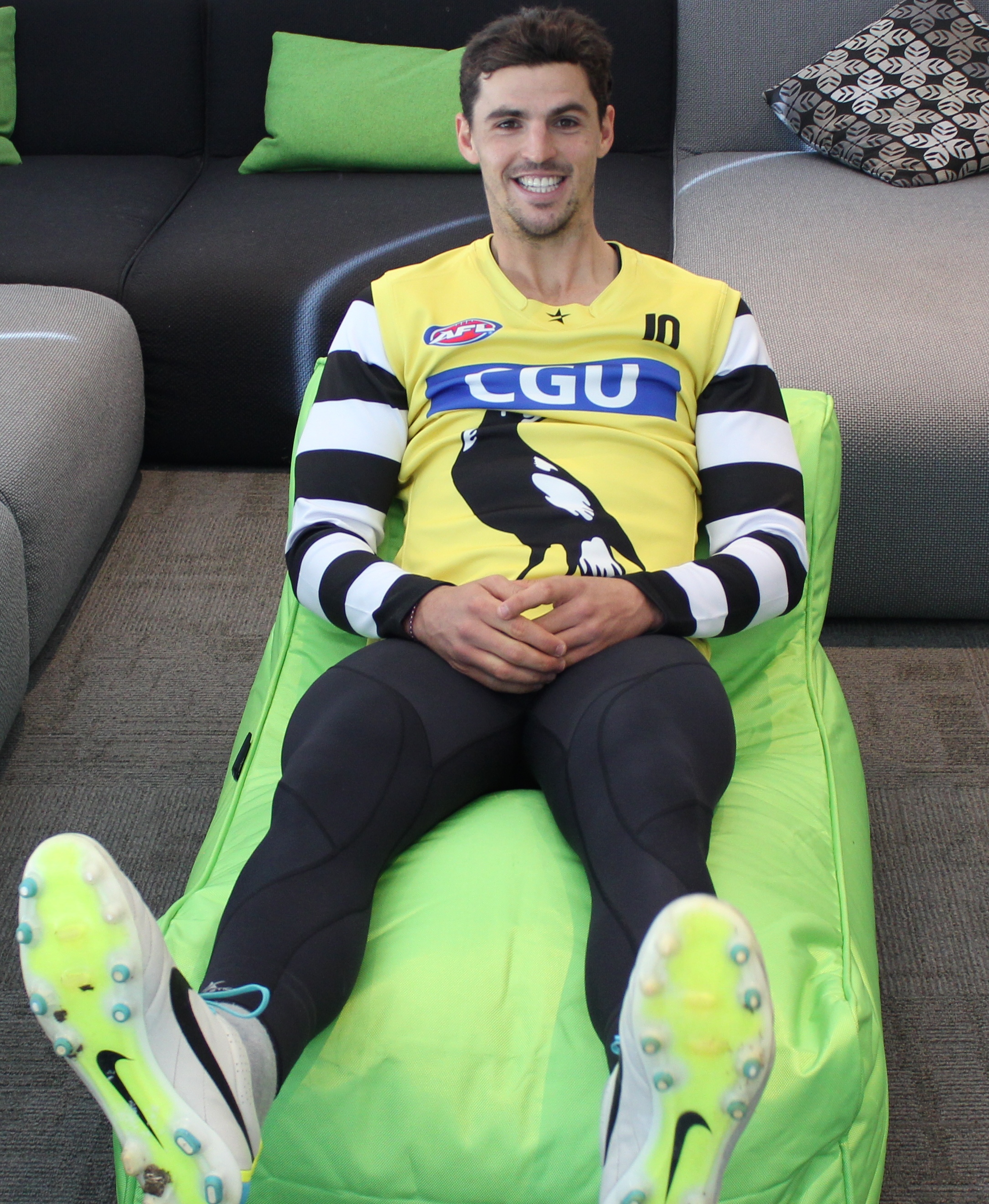 Collingwood FC captain Scott Pendlebury relaxes on Ambient Lounge bean bags after training.